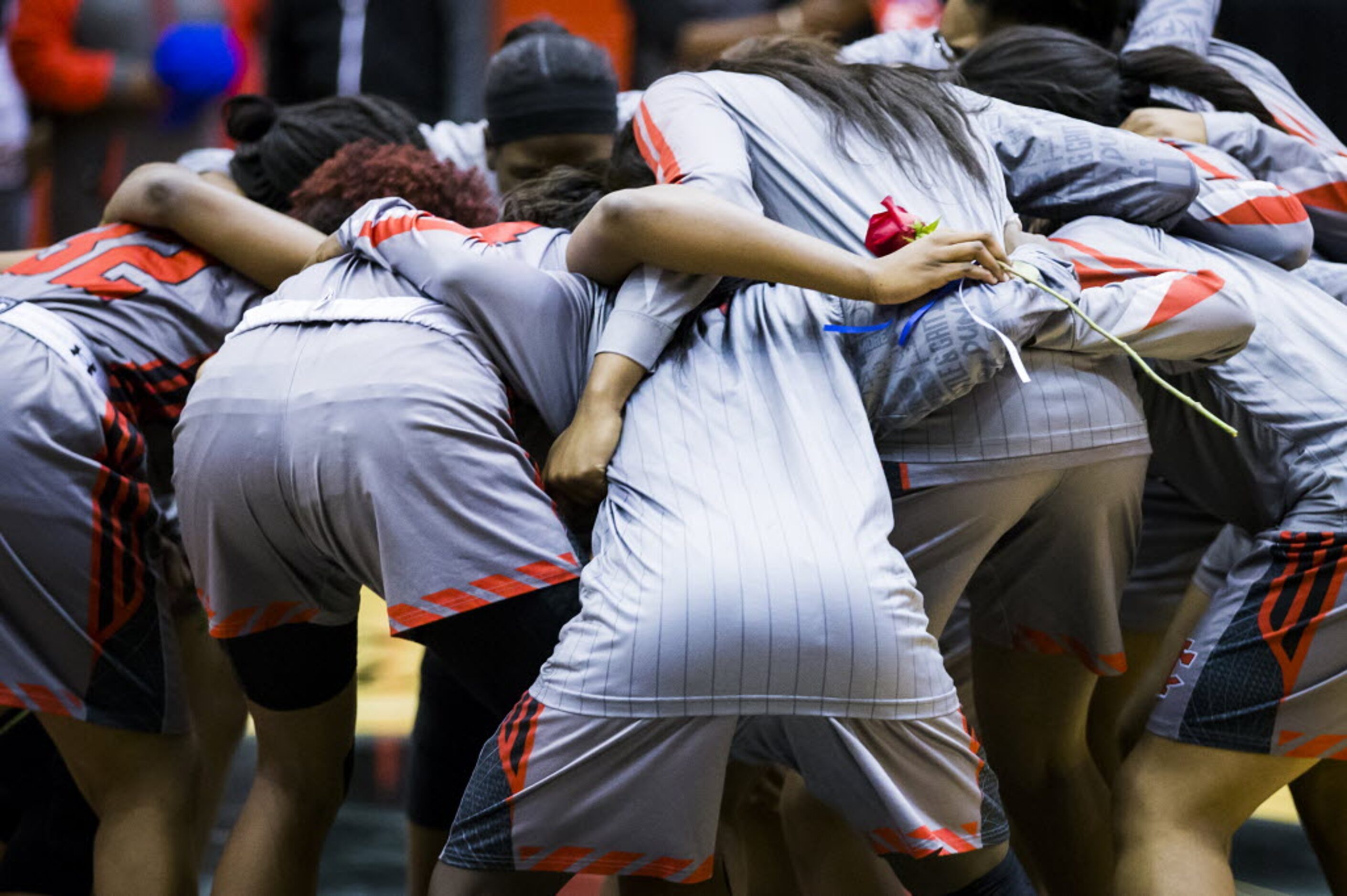 Cedar Hill players huddle before a girls high school basketball game against Duncanville at...