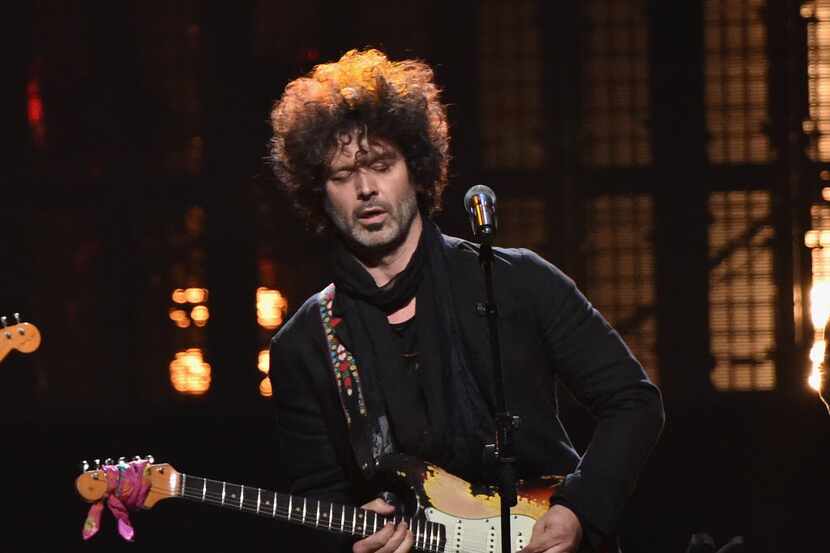 Musician Doyle Bramhall II performs a Stevie Ray Vaughan and Double Trouble song a onstage...