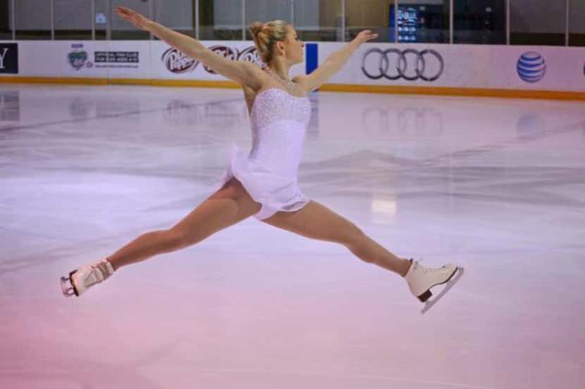 
Ashley Cain, a Coppell resident and member of the U.S. figure skating team, trains at the...