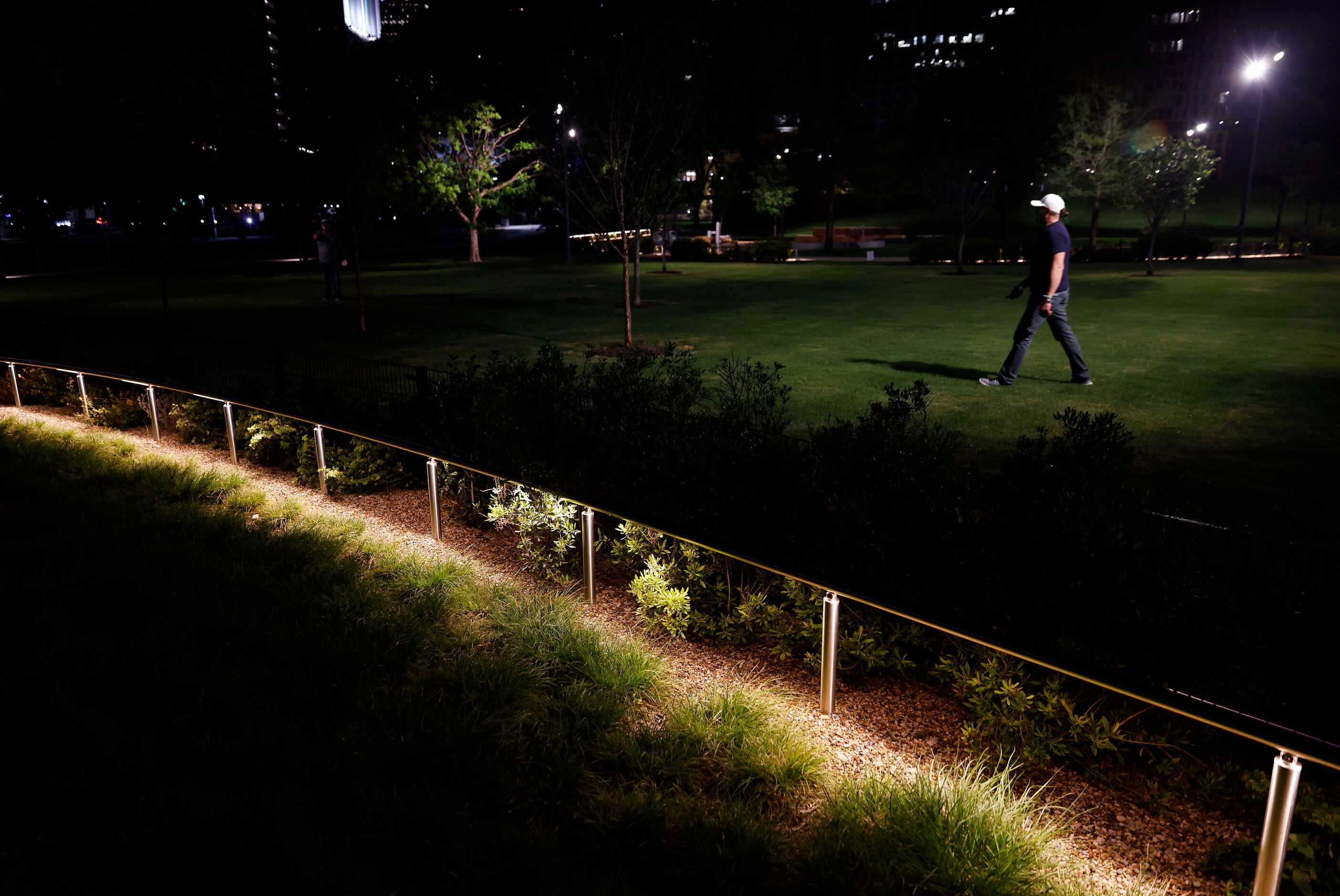Overhead spot lights and under low rails light up the newly constructed Carpenter Park at...