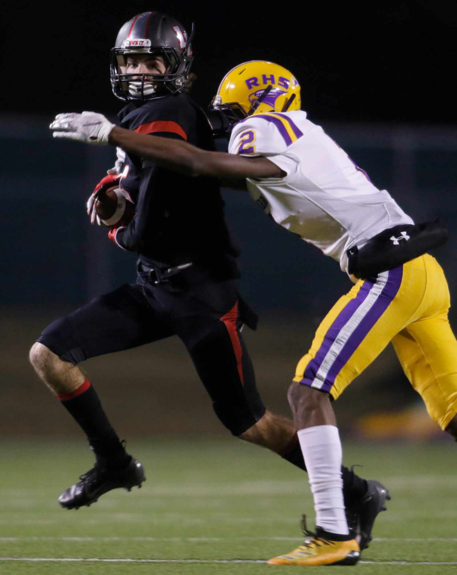 Lake Highlands receiver Evan Moudy (5) tacks yardage onto a reception for a long gainer as...