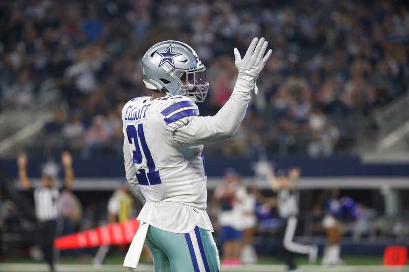 Dallas Cowboys running back Ezekiel Elliott (21) reacts during an NFL football game between...