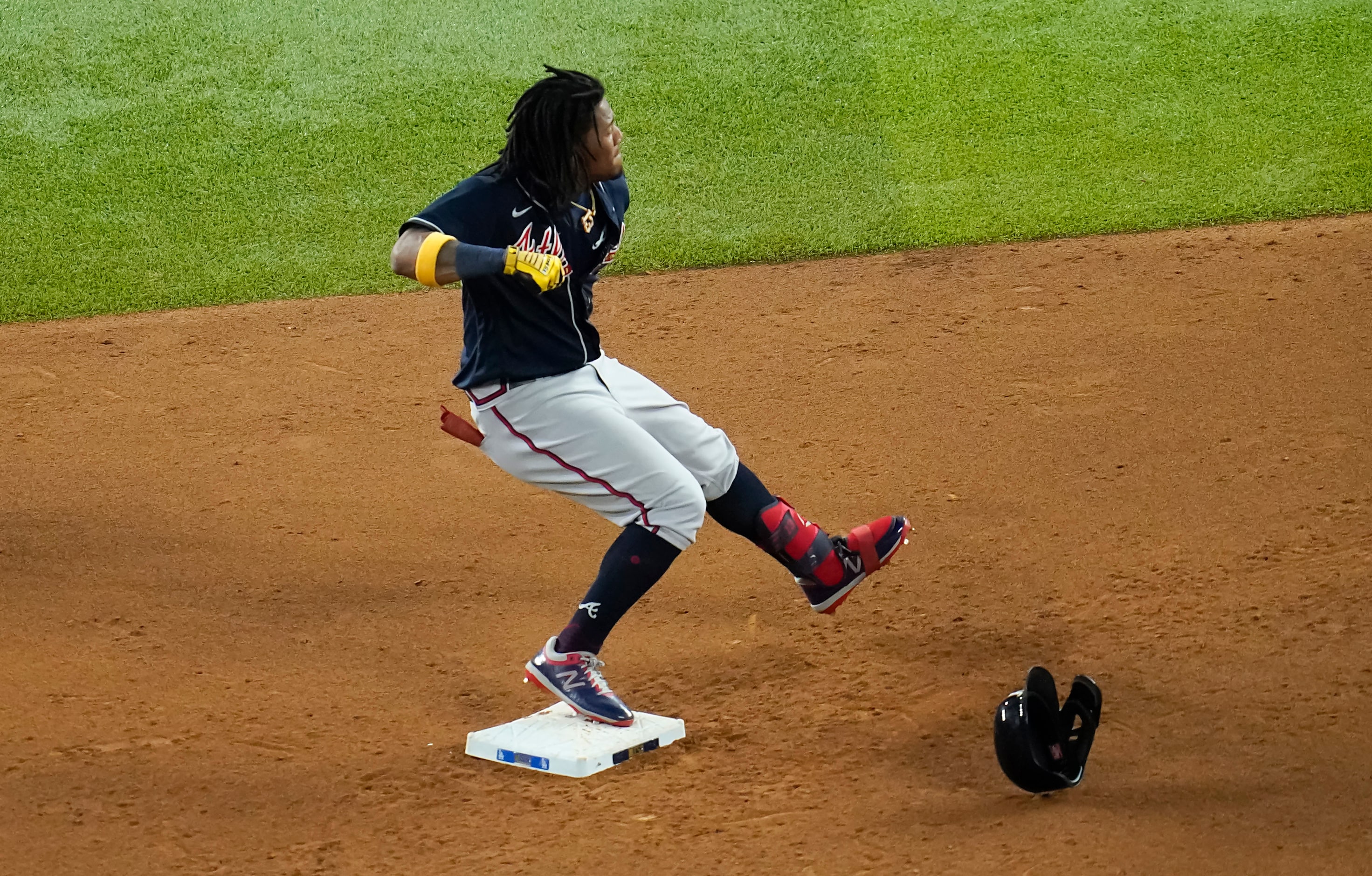 Atlanta Braves center fielder Ronald Acuna Jr. celebrates after reaching on a double during...