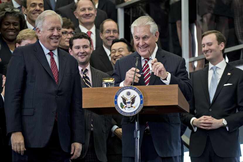 Rex Tillerson speaks Thursday to employees at the State Department in his first full day as...