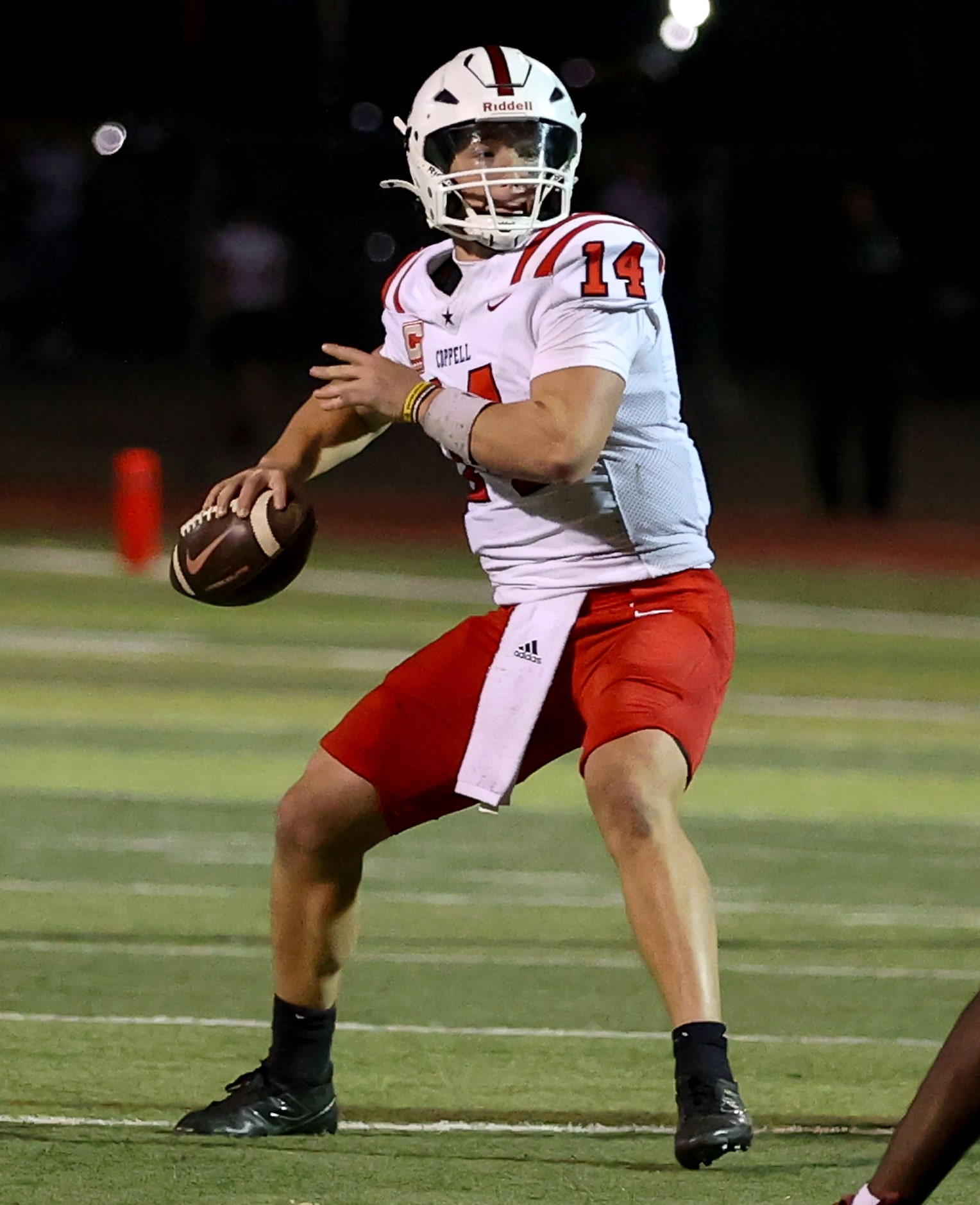 Coppell quarterback Edward Griffin (14) throws for 460 yards and 6 touchdowns against...