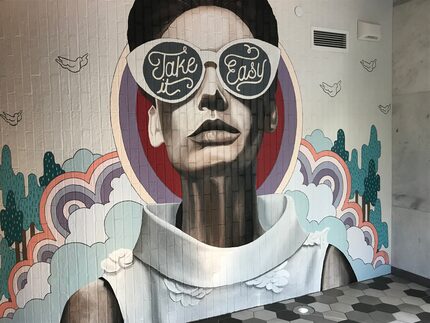 A stunning mural at the entryway of Overeasy, a recently-opened diner at the Statler Hotel...