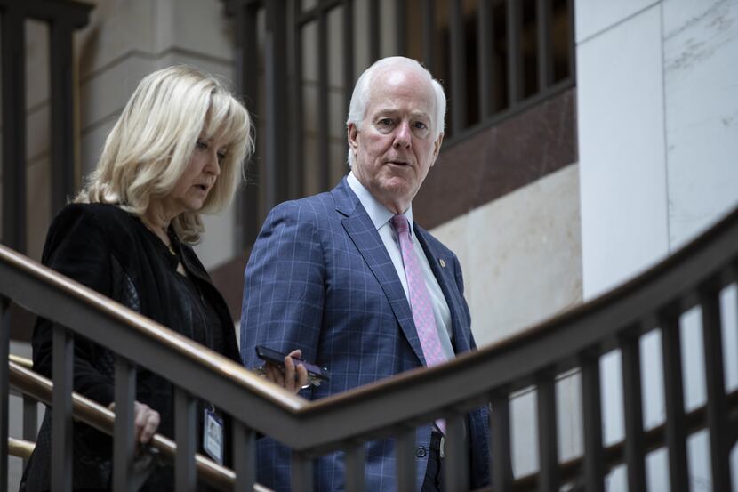 Sen. John Cornyn heads to a briefing from the Department of Homeland Security, FBI and other...