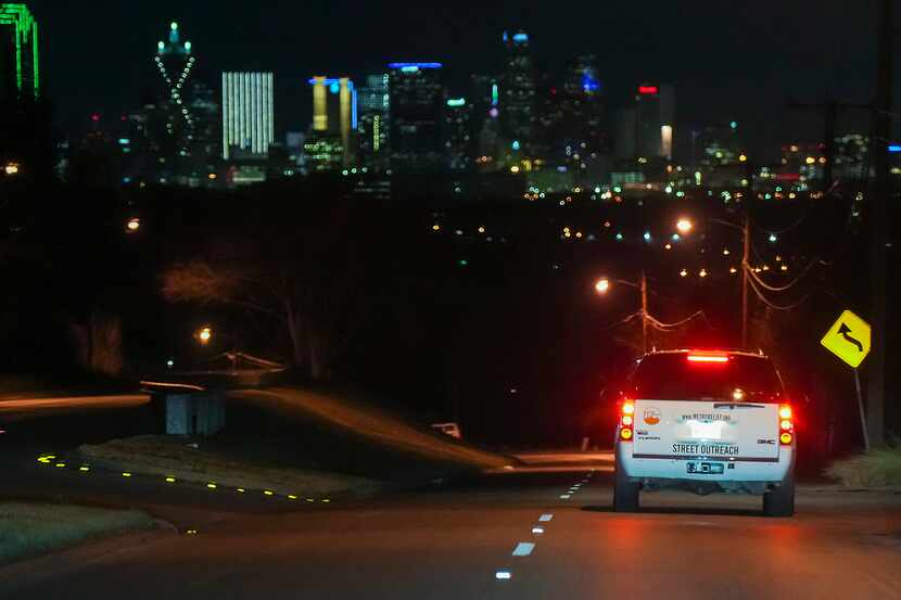 Charlie Leavitt, director of Metro Relief, drives toward downtown on Kiest Boulevard during...