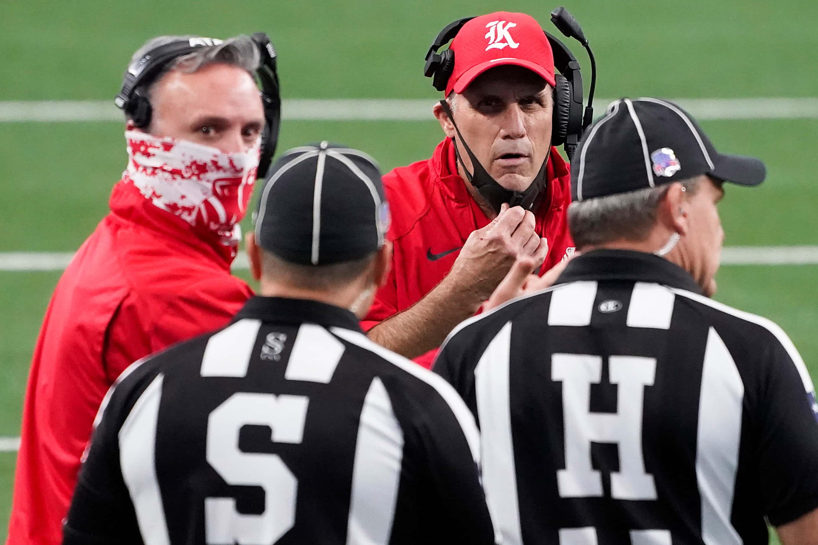 Katy head coach Gary Joseph argues a call during the first half of the Class 6A Division II...