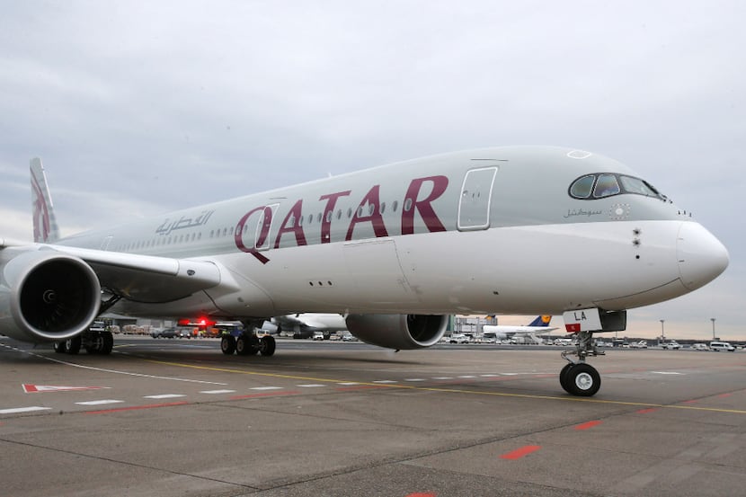 FILE - In this Jan. 15, 2015, file photo, a new Qatar Airways Airbus A350 approaches the...