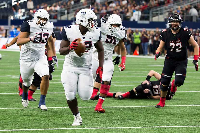 Allen defensive lineman Jayden Jernigan (42) recovers a fumble by Lake Travis quarterback...