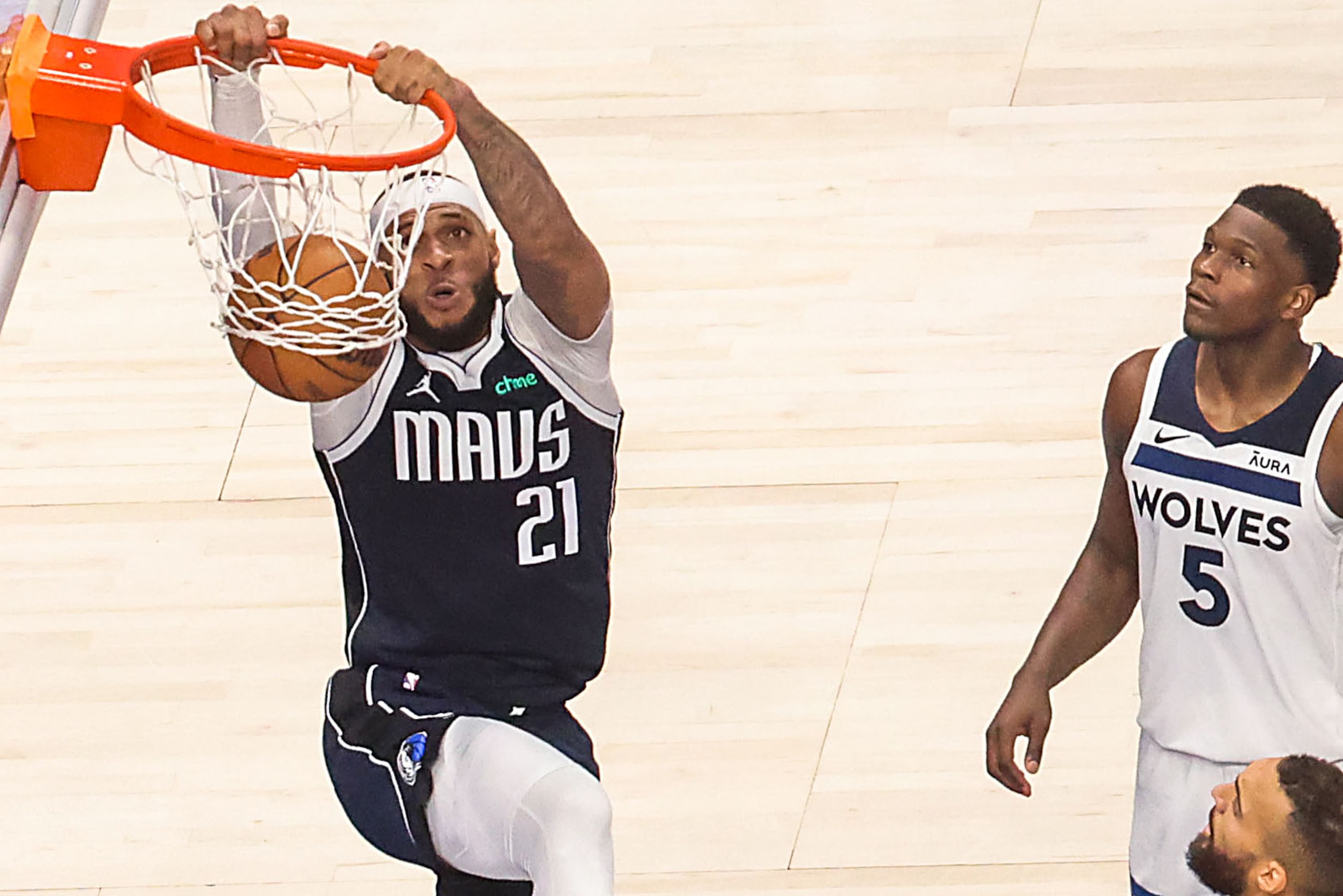 Dallas Mavericks center Daniel Gafford dunks the ball as Minnesota Timberwolves guard...