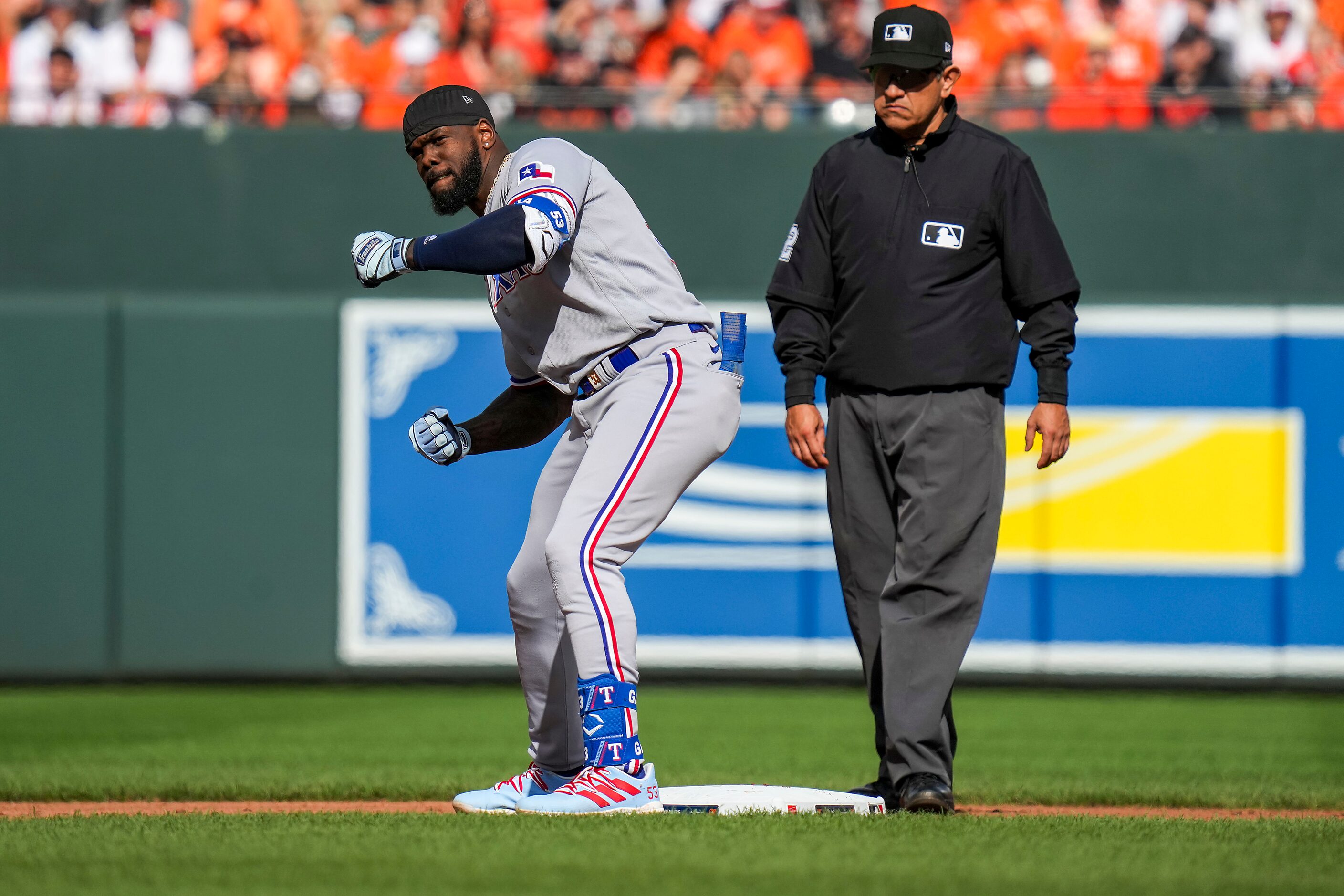 Texas Rangers right fielder Adolis Garcia celebrates after reach second base with a double...