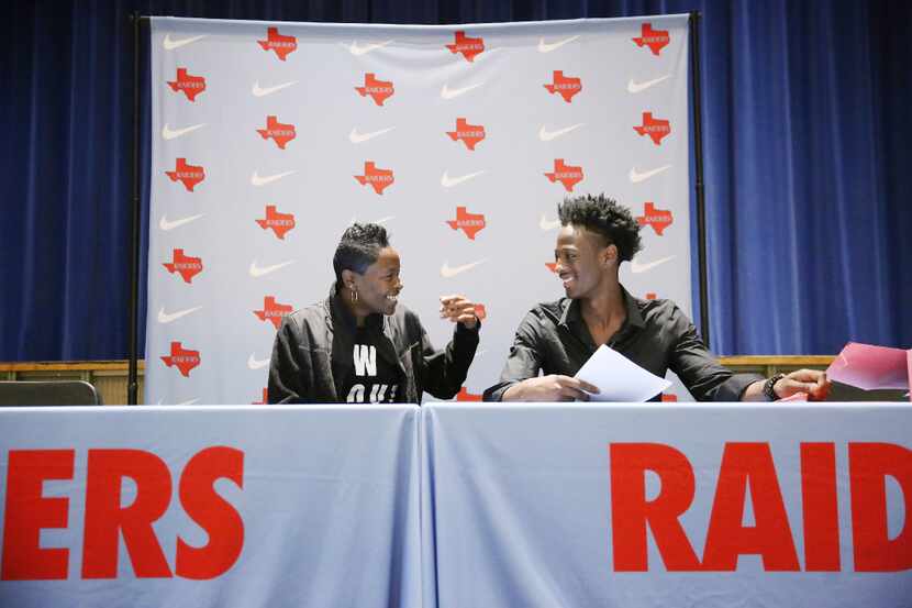Skyline student athlete Marcus Garrett (right) speaks with his mother Latania Garrett before...