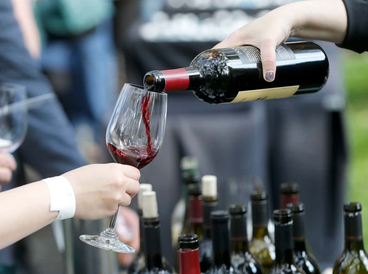 Decoy red wine is sampled at the Nasher Sculpture Garden during the Savor Dallas Wine Stroll...