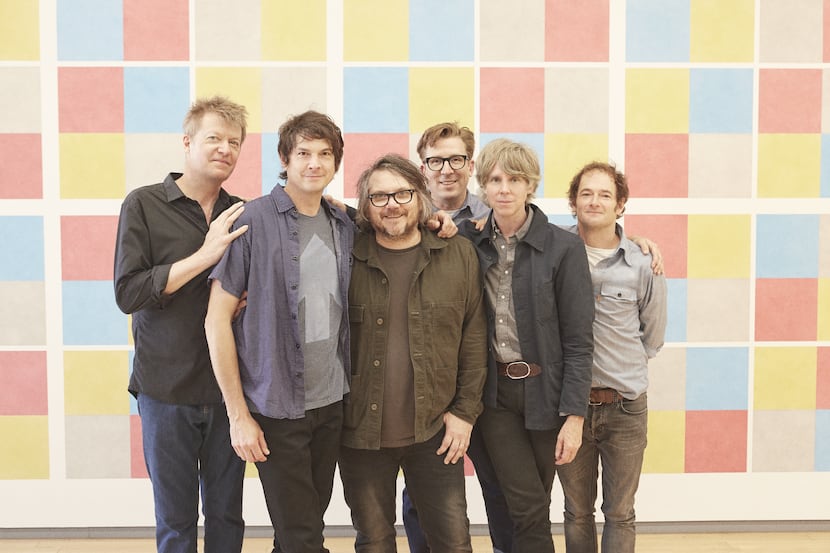 Jeff Tweedy, third from left, poses with members of the band Wilco.
