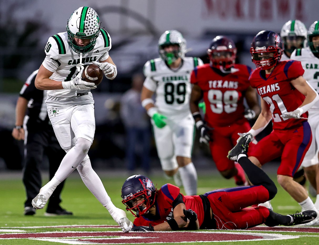 Southlake Carroll wide receiver Brody Knowles (10) comes up with a reception against Justin...