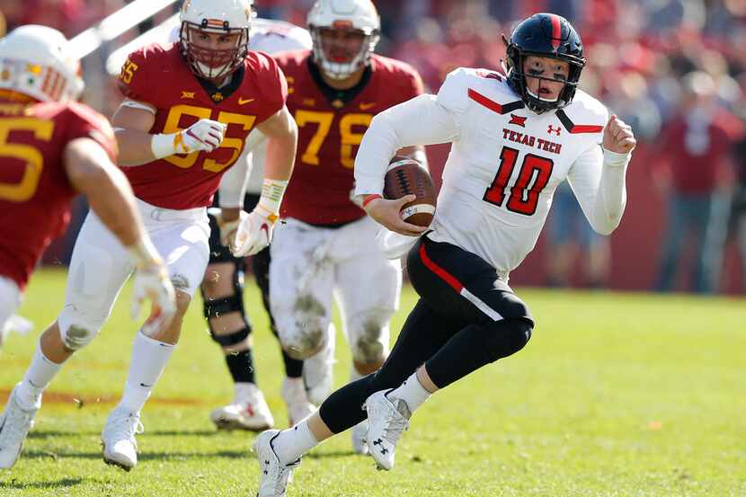 FILE - In this Oct. 27, 2018, file photo, Texas Tech quarterback Alan Bowman runs upfield...