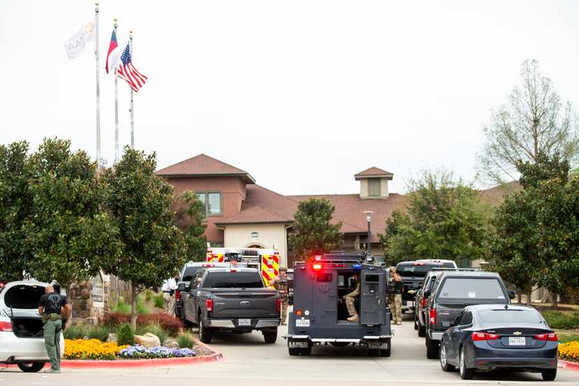 Authorities gather at La Valencia at Starwood in Frisco, Texas on Friday, March 29, 2019. A...