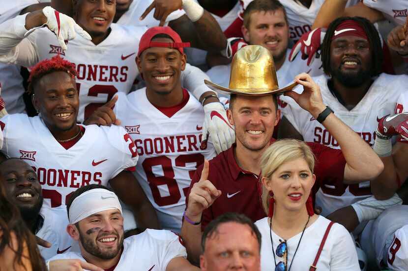 DALLAS, TX - OCTOBER 14:  Head coach Lincoln Riley of the Oklahoma Sooners wears the Golden...