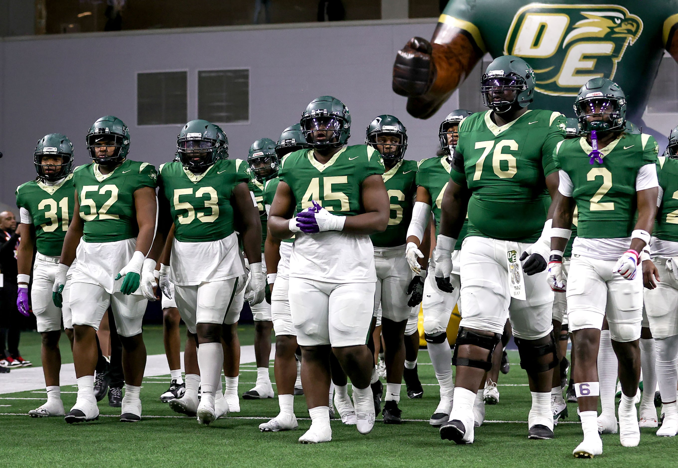 The DeSoto Eagles walk onto the field to face Willis in a Class 6A Division II Region II...