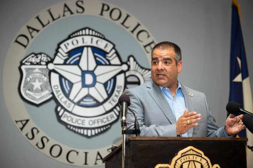 Mike Mata, Dallas Police Association President, conducts a press conference to discuss...
