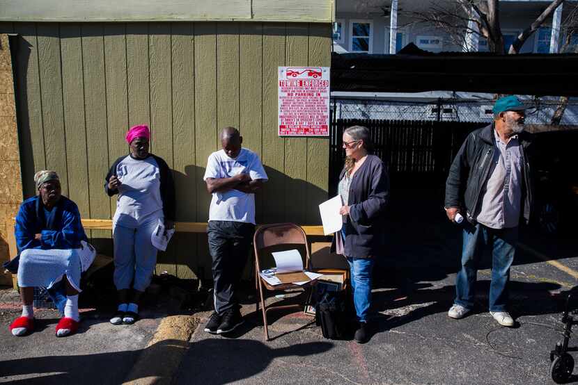 Tenants of Bryan Song Apartments met with Sandy Rollins (second from right) on Jan. 28. The...