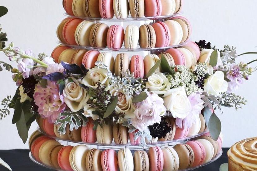 Bisous Bisous Pâtisserie’s  macaron tower for May has rose and cherry blossom flavors that...