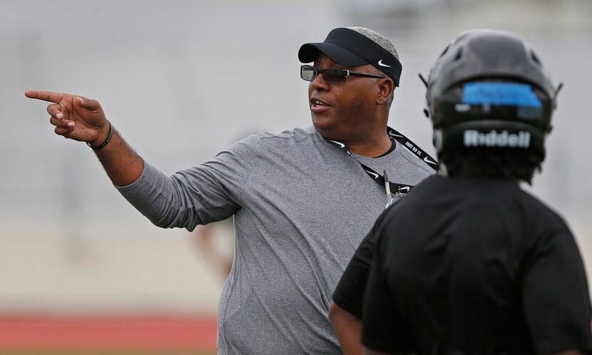 A player gets instruction as Head Coach Derick Roberson runs the first spring practice for...