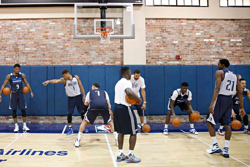 Dallas Mavericks players work on dribbling during practice Thursday, October 1, 2015 at the...