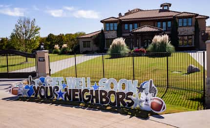 Get well signs placed outside of Dak Prescott's home in Prosper on Tuesday, Oct. 13, 2020....