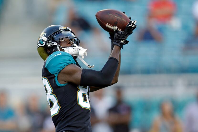 Jacksonville Jaguars wide receiver Allen Hurns catches a pass as he warms up before an NFL...