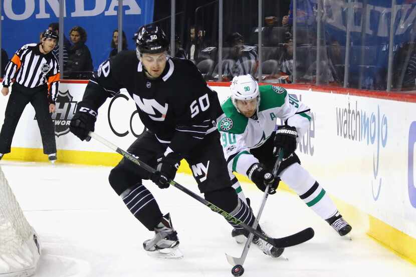NEW YORK, NY - JANUARY 19: Adam Pelech #50 of the New York Islanders and Jason Spezza #90 of...