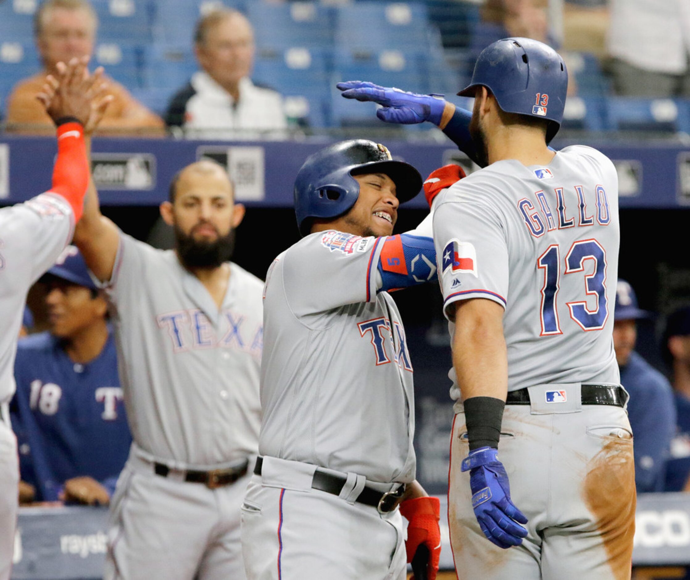 ST. PETERSBURG, FL - JUNE 30:  Willie Calhoun #5 of the Texas Rangers celebrates with...