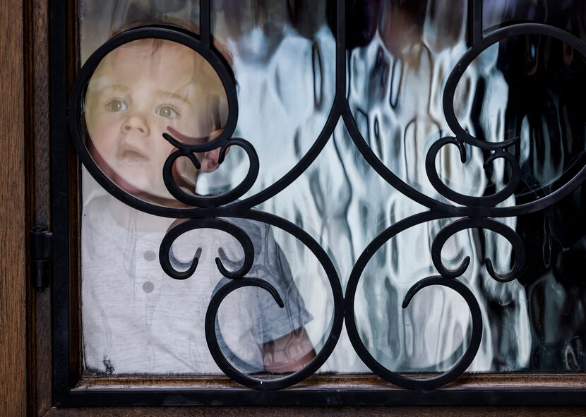 Brooks Rosvold waits for the movers to arrive at his family's house in Celina.