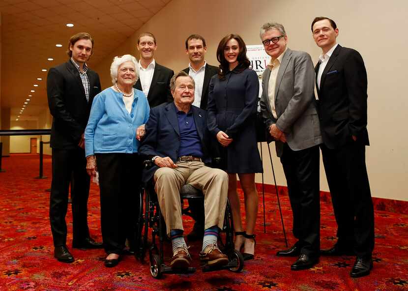 In this 2014 file photo, former President George H.W. Bush, former first lady Barbara Bush...