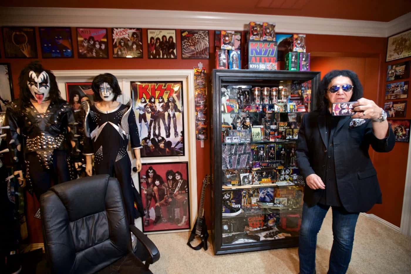 KISS bassists Gene Simmons tours a room dedicated to KISS memorabilia collected by the...
