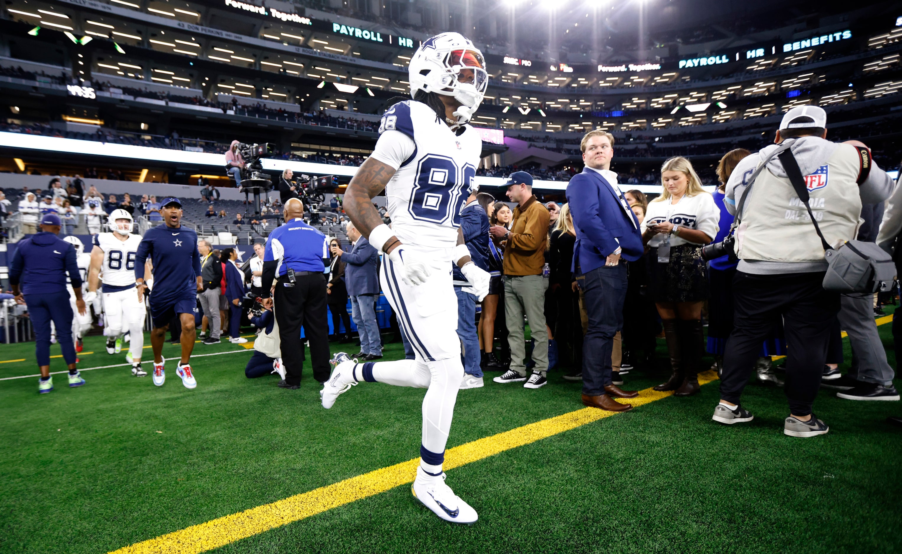 Dallas Cowboys wide receiver CeeDee Lamb (88) takes the field for  pregame warmups before...