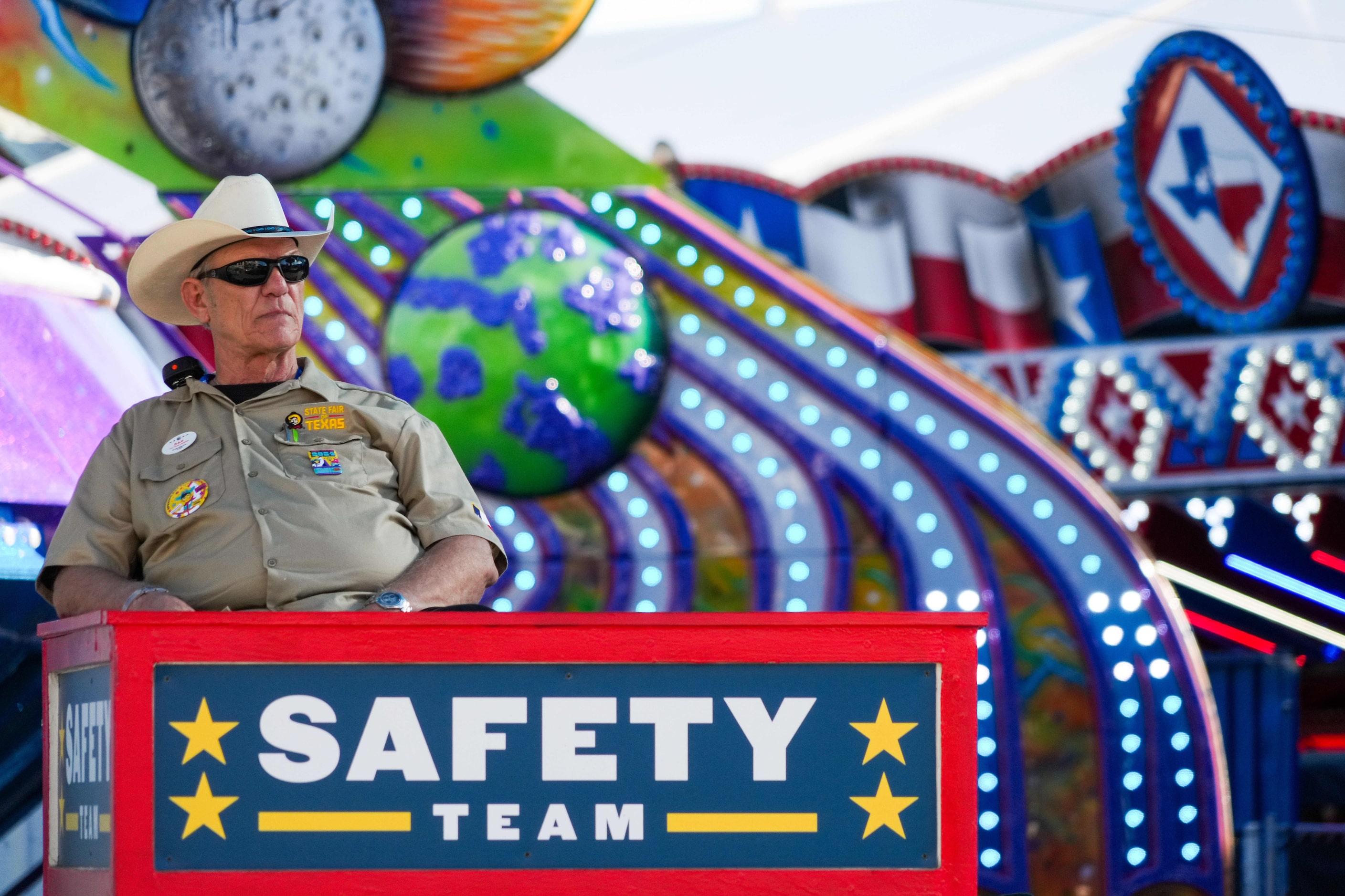 A member o the State Fair of Texas Safey Team looks out over the midway on Sunday, Sept. 29,...