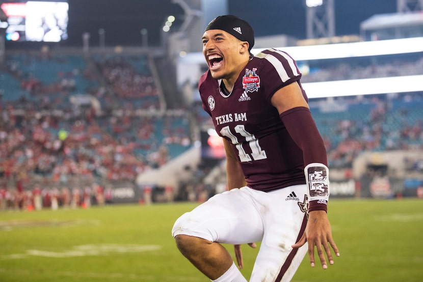 Texas A&M quarterback Kellen Mond (11) celebrates in the closing seconds of the team's 52-13...