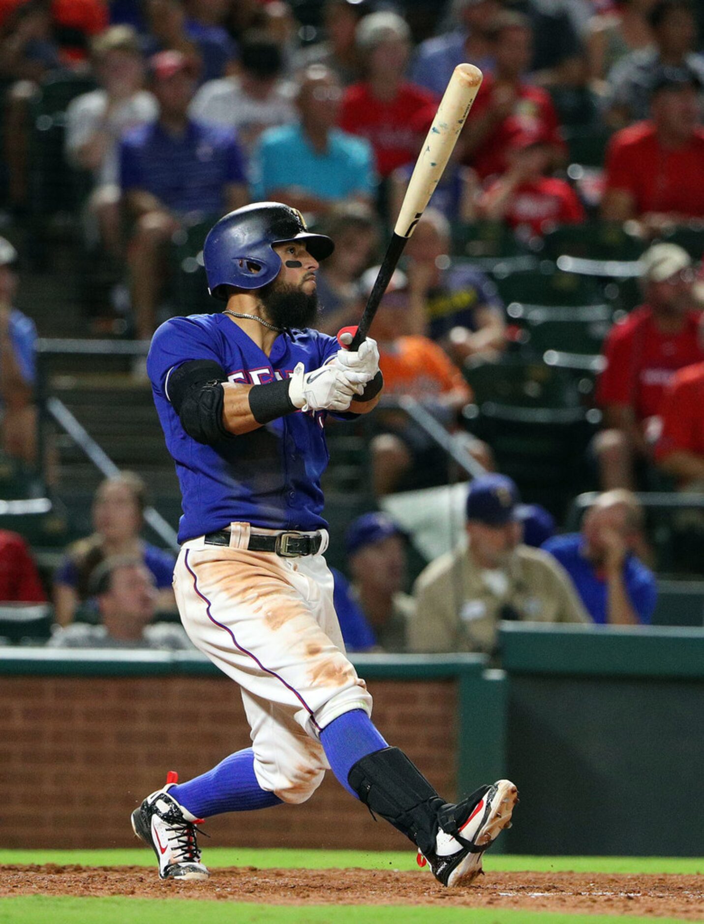 ARLINGTON, TX - AUGUST 04:  Rougned Odor #12 of the Texas Rangers watches his home run shot...