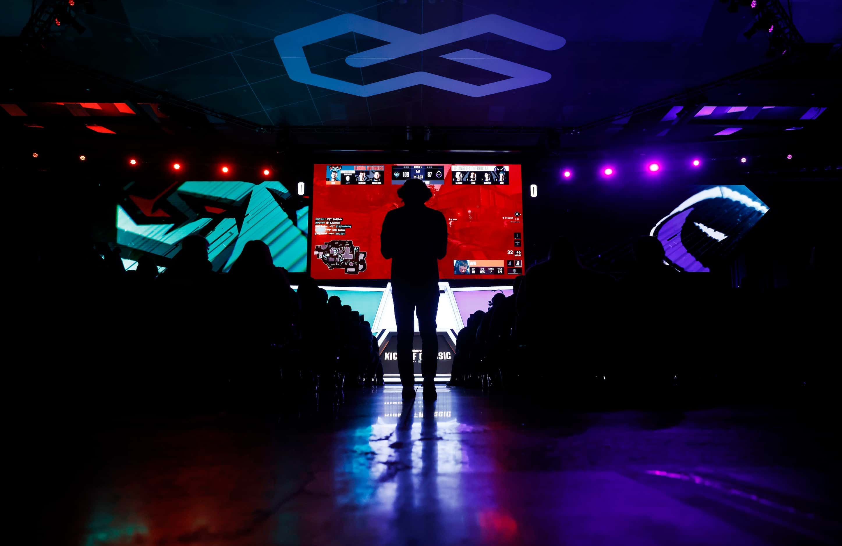 A fan watches an opening day round at the Call of Duty League season kickoff at Esports...