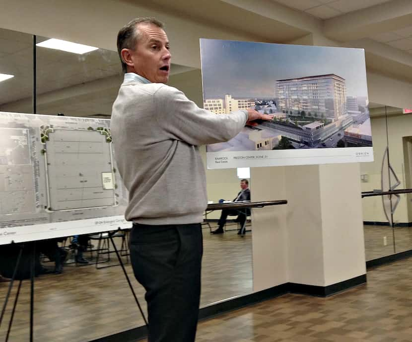 Here is Robert Dozier showing off his renderings Thursday night. Yes. That's Preston Center.