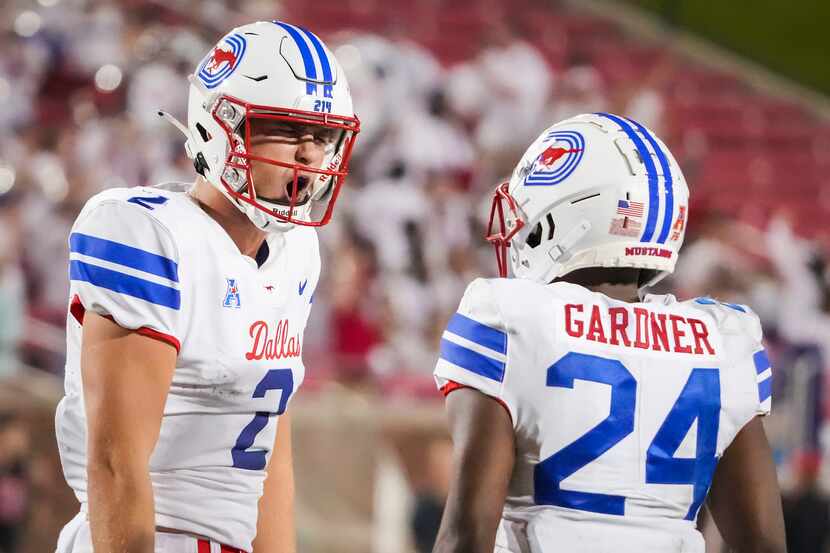 SMU quarterback Preston Stone (2) celebrates with running back Velton Gardner (24) after...