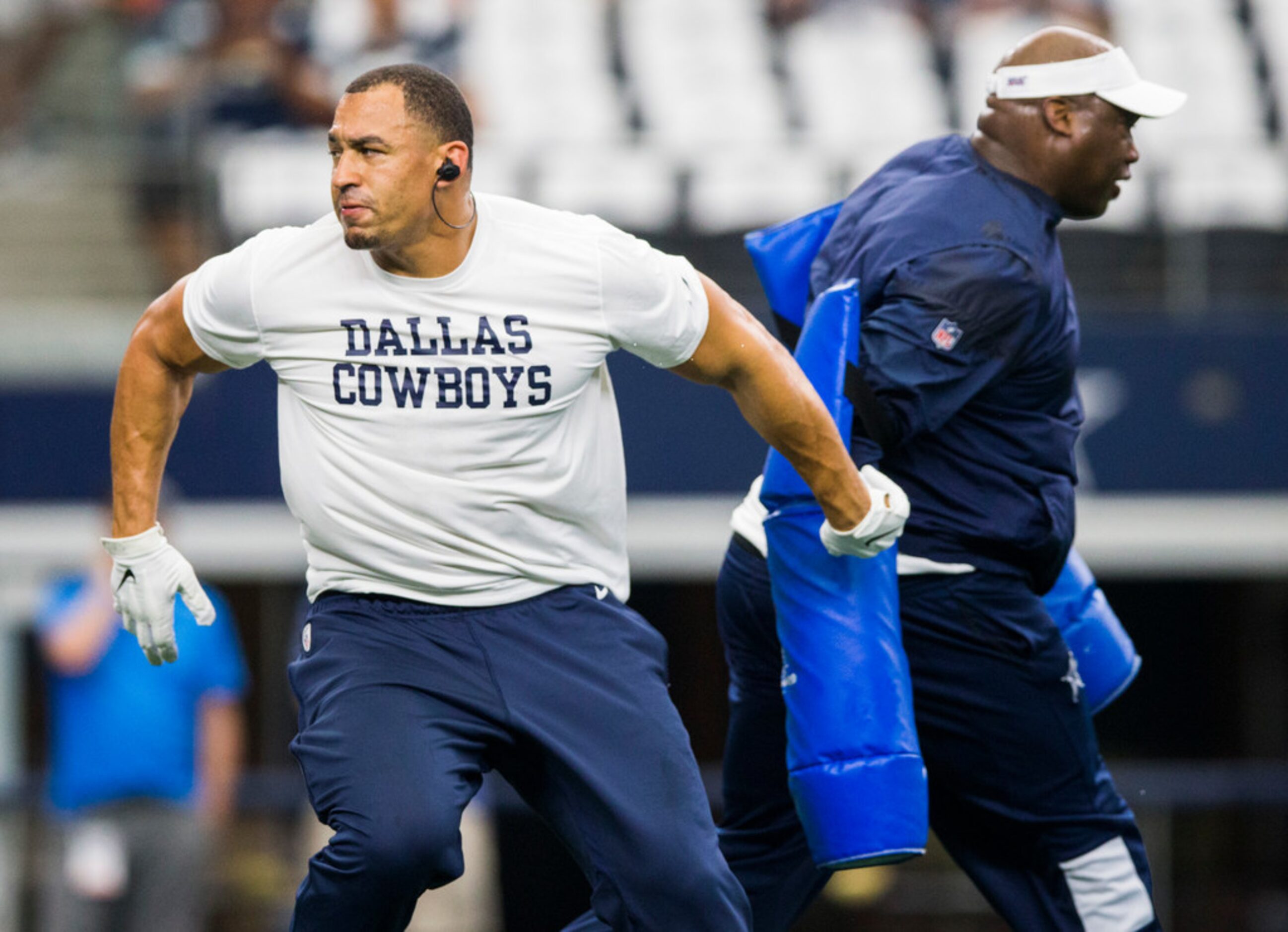 Dallas Cowboys defensive tackle Tyrone Crawford (98) warms up before an NFL game between the...