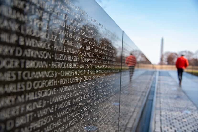The Vietnam Veterans Memorial is inscribed with the names of more than 50,000 Americans...