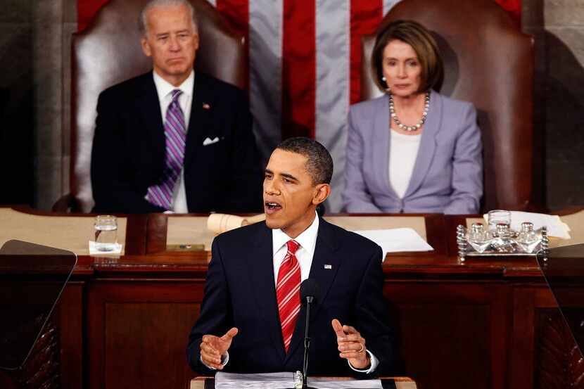 Vice President Joseph Biden and U.S. Speaker of the House Rep. Nancy Pelosi (D-CA) look on...