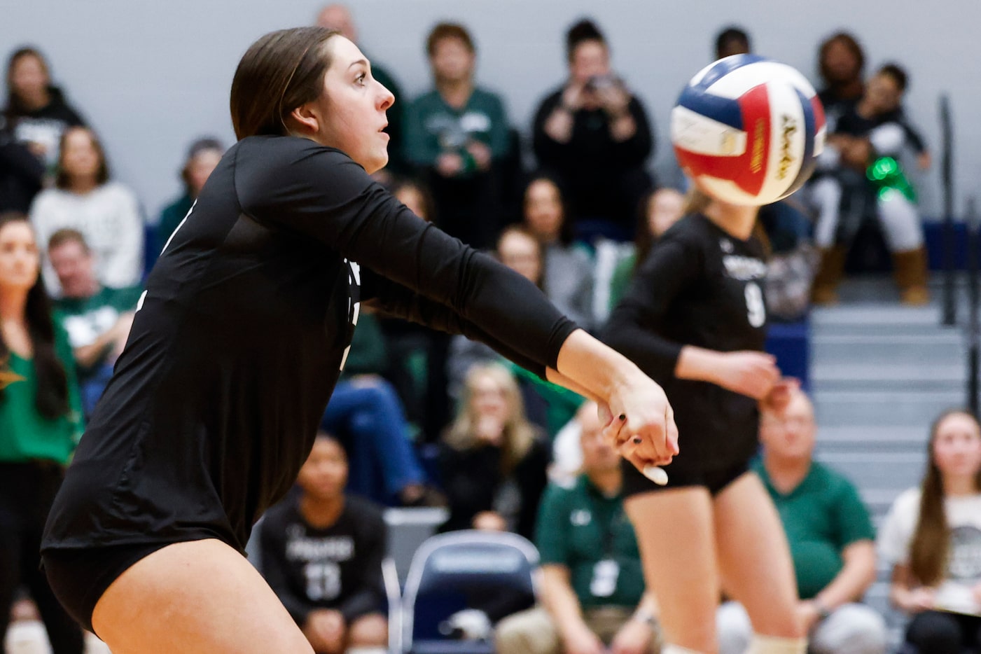 Prosper high school’s Allie Duitsman receives a serve against Plano West High during class...