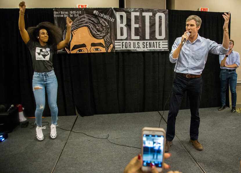 Singer Kelly Rowland, left, dances next to Senate candidate Beto O'Rourke as a crowd shouts...