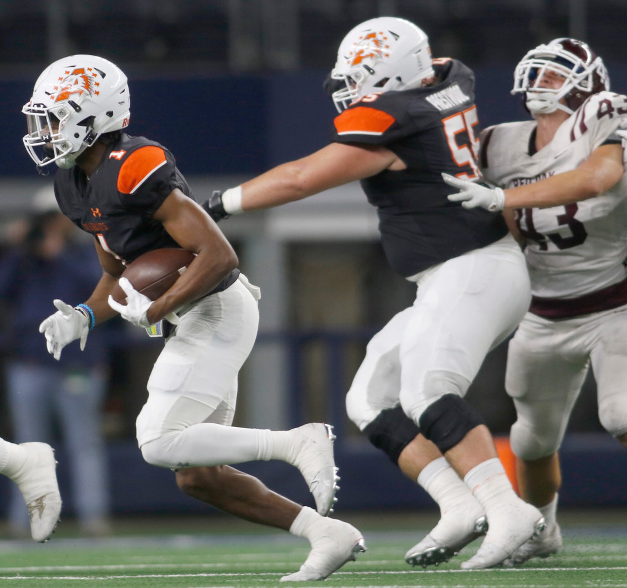 Aledo receiver JoJo Earle (1) takes the direct snap and rolls out of the backfield for a...